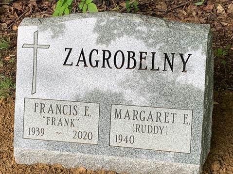 A picture containing text, gravestone, plaque

Description automatically generated