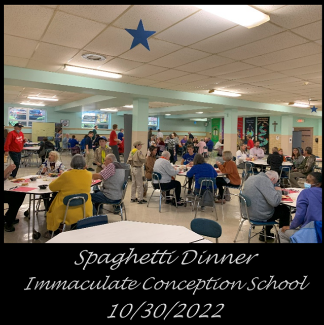 People enjoying the KOC spaghetti dinner at the Immaculate Conception school on October 30, 2022